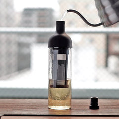 Hario Filter In Cold Brew Coffee Bottle Being Filled