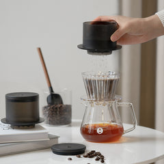 Timemore SimpleDrip Pour-Over Tool brewing scene with hand