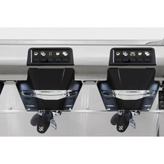 Rancilio Classe 5 Crono digital shot timers and dosing buttons above the two group heads.