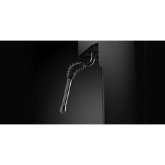 Close-up of the Gaggia Classic UP stainless steel steam wand with black protective grip.