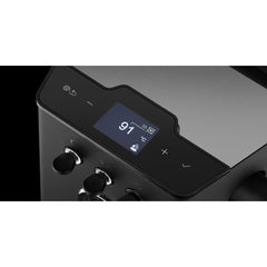 Close-up of the black Gaggia Classic UP digital display showing 91°C and touch controls.