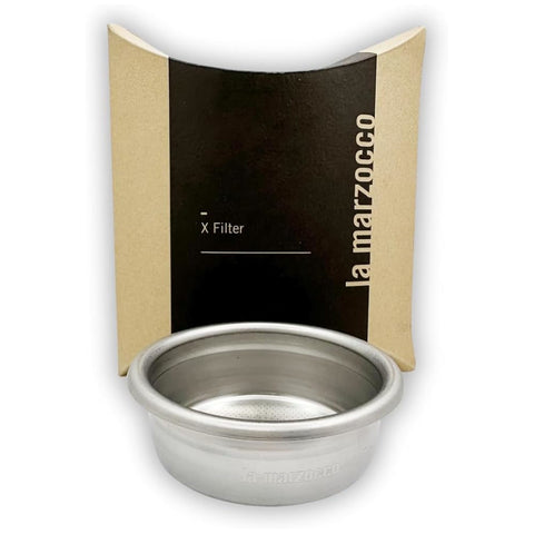 La Marzocco Filter X Basket in front with cardboard packaging