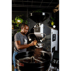 Genio Precision Roaster in-use opening the bean chute