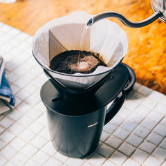 Brewing coffee with the Hario Mugen One Pour Dripper 02 size transparent black