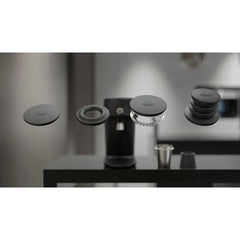 Included hoppers and bellows with Mahlkönig X64 SD espresso grinder in the background