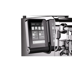 Close-up of the Rocket R58 TUNE touchscreen showing boiler temperatures and machine controls.