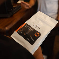 Scene of single origin Kenyan Gakundu AA coffee beans roasted by Rosetta in cafe