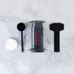 AeroPress Coffee Maker Components on Marble