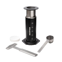 AeroPress Stainless Steel Coffee Press with stainless steel scoop, stirrer and paper filters.