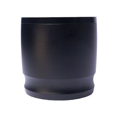 Close-up of the black Brew Tool Blind Coffee Shaker with its lid fitted.
