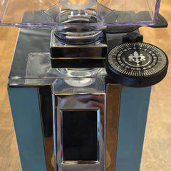 Eureka Mignon King Size Dial fitted to a blue and chrome coffee grinder beside the clear bean hopper.