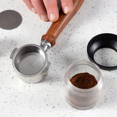 Flair 49 PRO Espresso Maker portafilter with cup of ground coffee