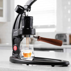 Flair 49 PRO Espresso Maker lifestyle shot with espresso glass