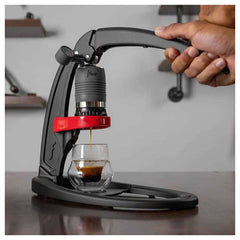 Flair Classic espresso maker in use on a bar