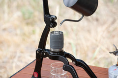 Flair Go Espresso Maker Filling With Kettle Outdoors