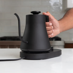 Flair Cafe Kettle Front View With Hand Holding