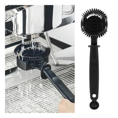 Group head cleaning brush in use cleaning an espresso machine