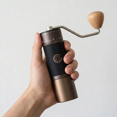 KINGrinder K7 Manual Coffee Grinder in hand