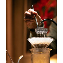 Melodrip Pour-Over Coffee Tool in use