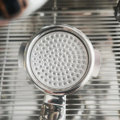 Normcore puck screen inside espresso machine portafilter