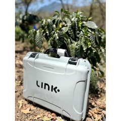 Nucleus Link Roaster case against a Coffea Arabica tree