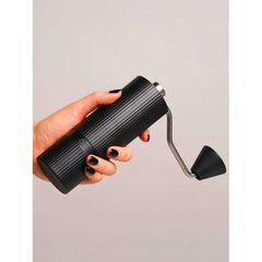 Nuttii X Timemore Goosey Hand Grinder 38mm Black in hand