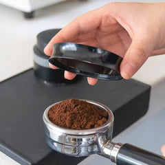 Presso espresso dosing collar being removed