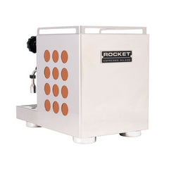 Rocket Appartamento 2.0 espresso machine with copper circular side inserts and Rocket badge, rear three-quarter view