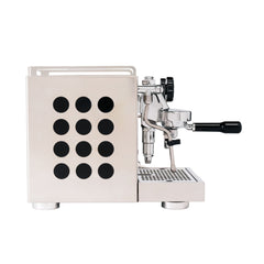 Rocket Appartamento 2.0 espresso machine, side view showing black circular inserts and portafilter