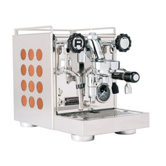 ocket Appartamento 2.0 espresso machine with copper circular side inserts, front three-quarter view