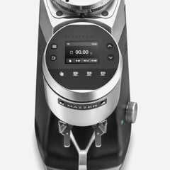 Close-up of the Mazzer Super Jolly g control panel showing the weight display and three dose preset buttons.