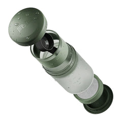 Exploded view of the Wacaco Prestina showing its cap, cup, brewing chamber and filter assembly.